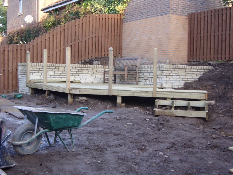 Decking reconstruction and retaining wall